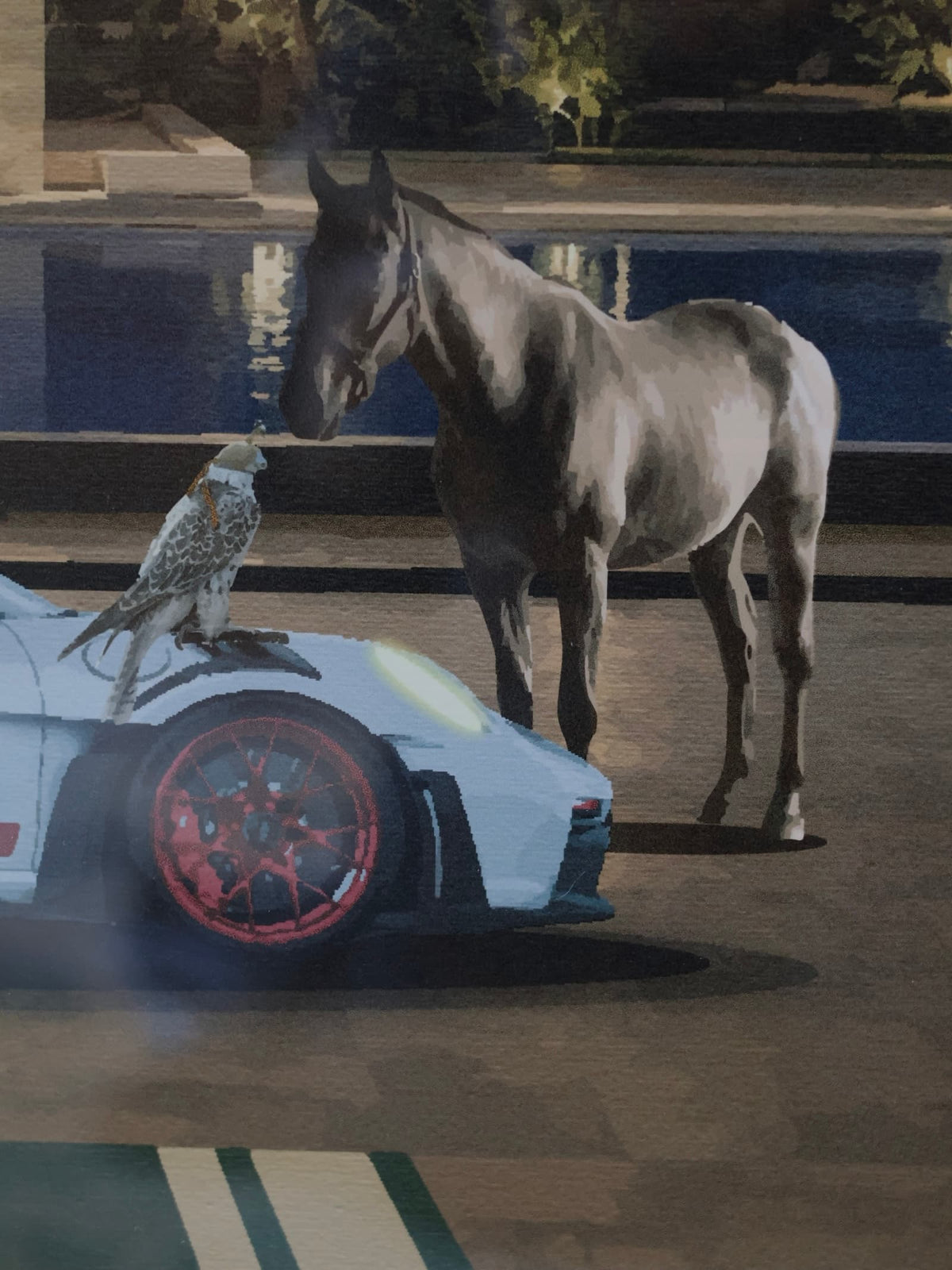 falcon perched on car hood beside horse, poolside at night