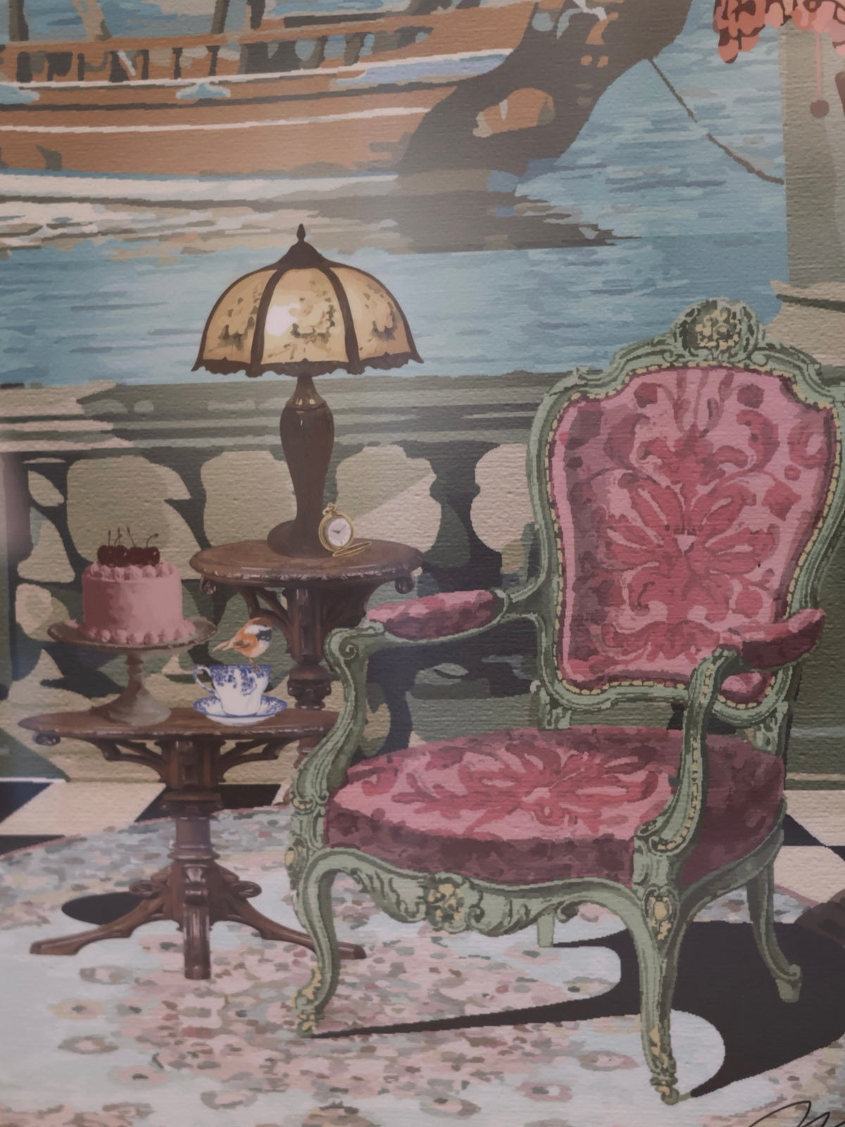 A vintage-style pink upholstered armchair with a green carved frame, a matching pink table lamp, a small cake on a pedestal.